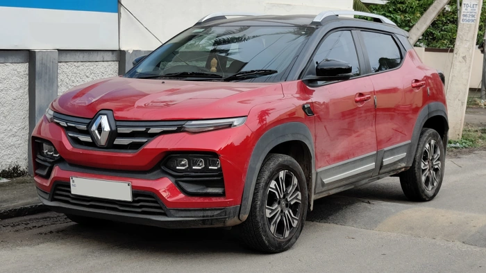 Renault Kiger na cor vermelha. Explicando quanto custa o consórcio do suv compacto completo da Renault.